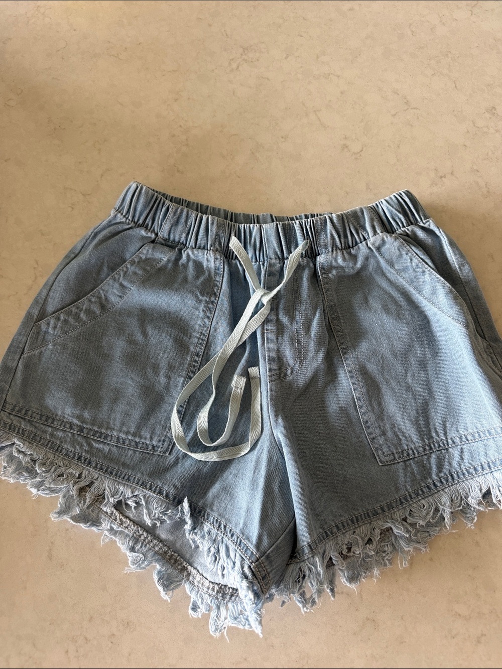 Women's Light Blue Denim Drawstring Fringe Shorts
